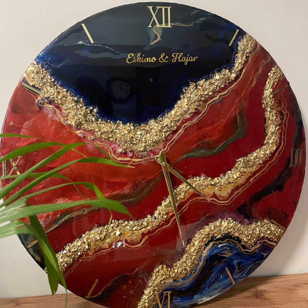 "Front view of a geode-themed resin clock showcasing vibrant, layered crystal patterns and metallic accents around the clock face."